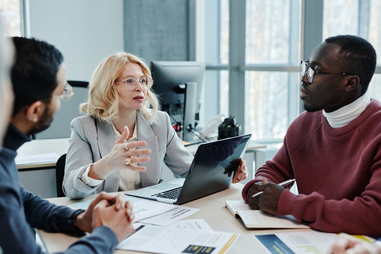 Small business HR team managing employees using HRM dashboard