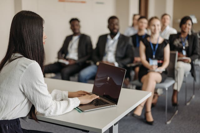 Corporate trainers conducting staff onboarding and training